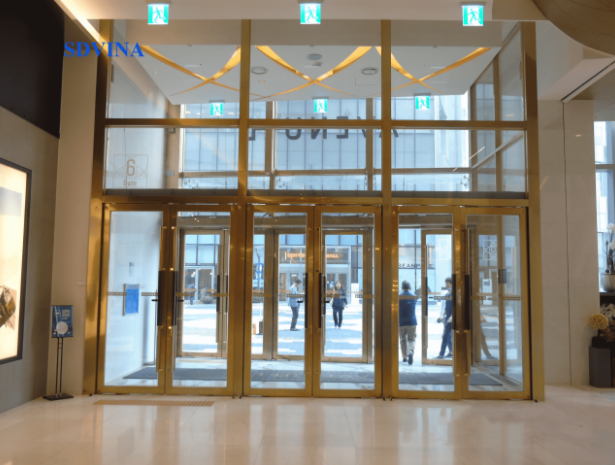 Cửa kính khung inox mạ vàng 1
