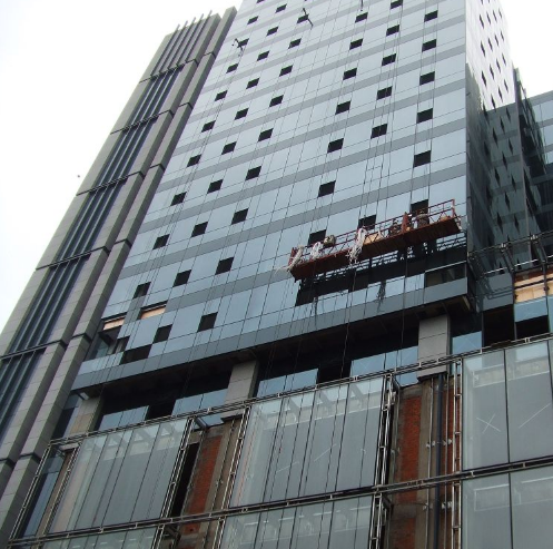 Dàn đứng thi công kính tòa cao tầng